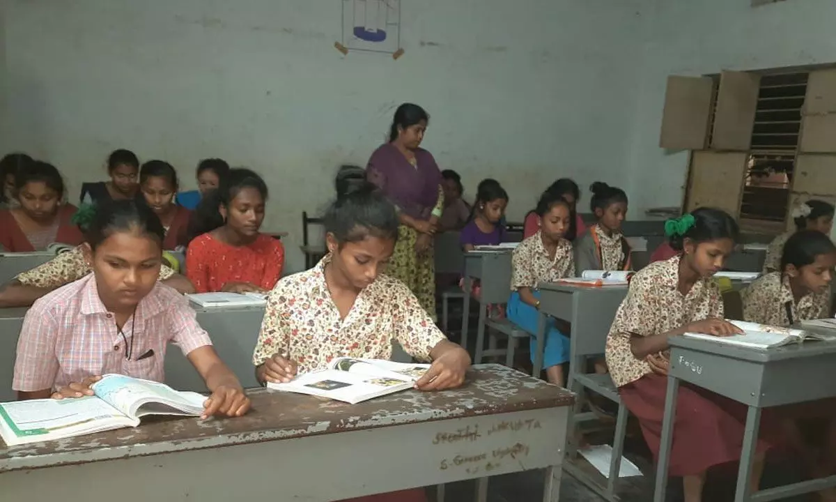 Tribal Students attending study hours at an Ashram School in the district.