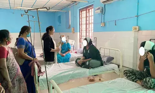 State Women Commission member Karri Jayasri Reddy interacting with the victims at Rajamahendravaram Government Hospital on Sunday