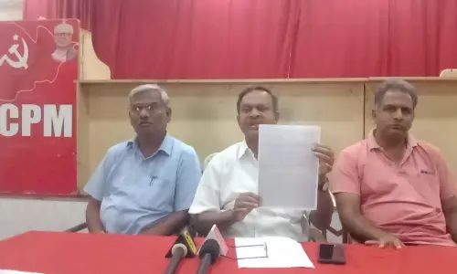 CPM district secretary Pasam Rama Rao addressing a press meet in Guntur on Sunday. Party leaders Appa Rao and K Nalini Kanth are also seen.