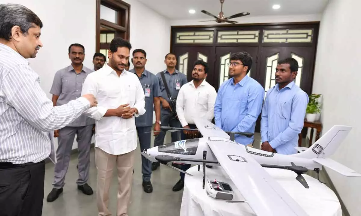 Officials explain the drone technology being used for comprehensive land resurvey programme to Chief Minister Y S Jagan Mohan Reddy during a review on YSR Jagananna Saswatha Bhu Hakku- Bhu Raksha scheme at his camp office in Tadepalli on Monday