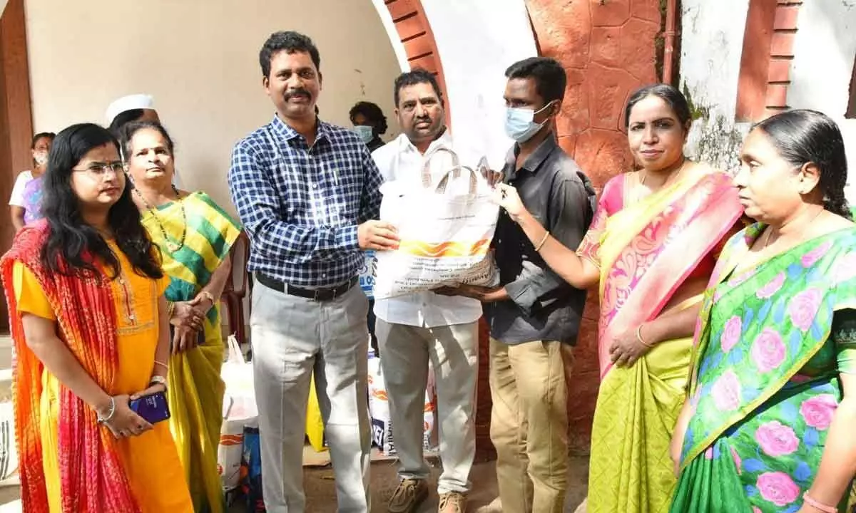 District Collector S Dilli Rao and Joint Collector Nupur Ajay distributing nutrition kits to TB patients in Vijayawada on Monday