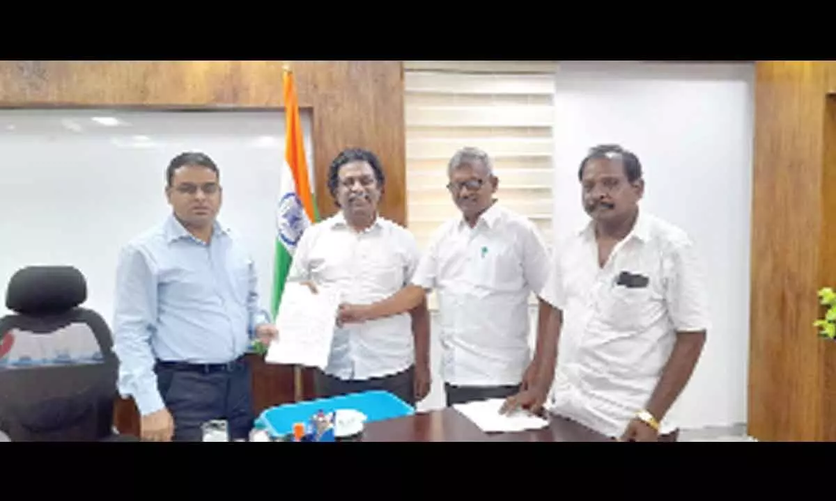 MLC KS Lakshmana Rao, CPM leader Ch Babu Rao and Sanitation Workers Association president M Ravi submitting a memorandum to CRDA Commissioner Vivek Yadav at the CRDA office in Vijayawada on Monday