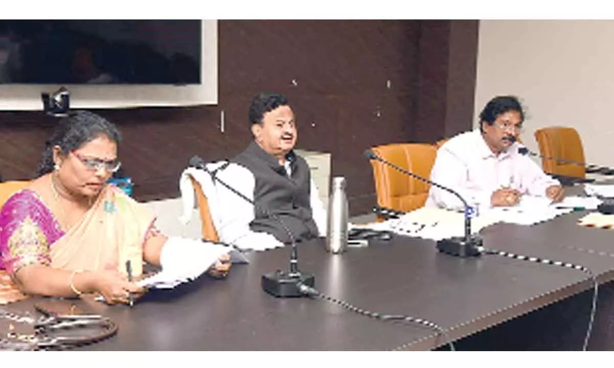 District Collector K Venkataramana Reddy addressing the preparatory meeting on Covid at the Collectorate in Tirupati on Monday. DCHD Dr Prabhavathi and DM&HO Dr U Sreehari are seen.