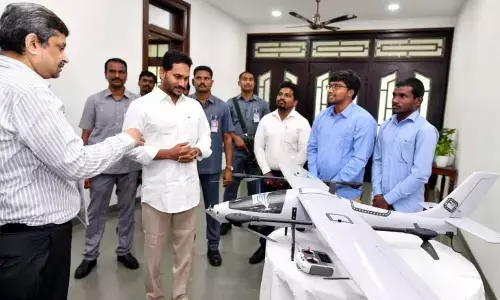 YS Jagan inspects Drones and Survey stones used for Jagananna Saswata Bhu Hakku Bhu Raksha