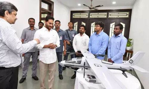 Officials explain the drone technology being used for comprehensive land resurvey programme to Chief Minister Y S Jagan Mohan Reddy during a review on YSR Jagananna Saswatha Bhu Hakku- Bhu Raksha scheme at his camp office in Tadepalli on Monday