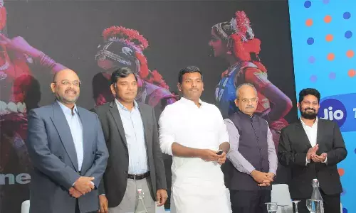 Minister for industries Gudivada Amarnath, chief secretary Dr K S Jawahar Reddy and director general of police K V Rajendranath Reddy launching Jio True 5G in Vijayawada on Monday. 	Hans photo Ch Venkata Mastan
