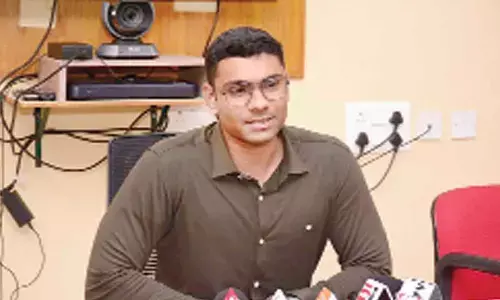 Joint collector K S Viswanathan speaking at a conference in Visakhapatnam on Monday