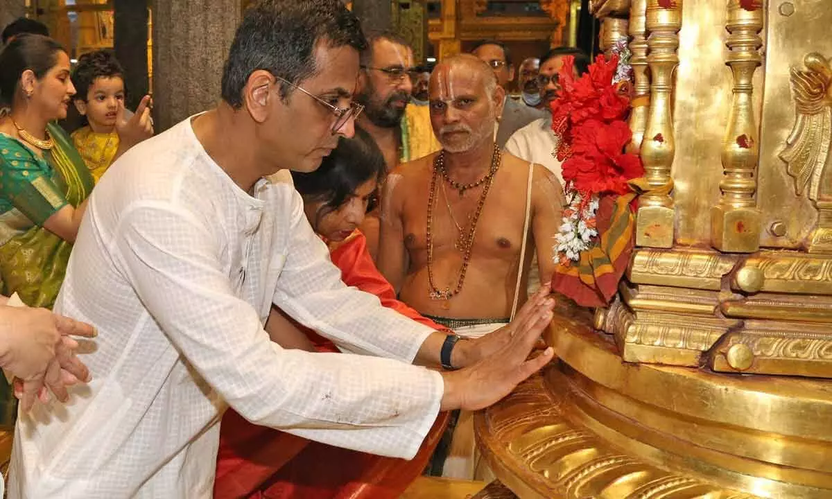 Chief Justice of India Justice D Y Chandrachud offering prayers at the Dhwajasthambham at Goddess Padmavathi temple at Tiruchanur on Wednesday