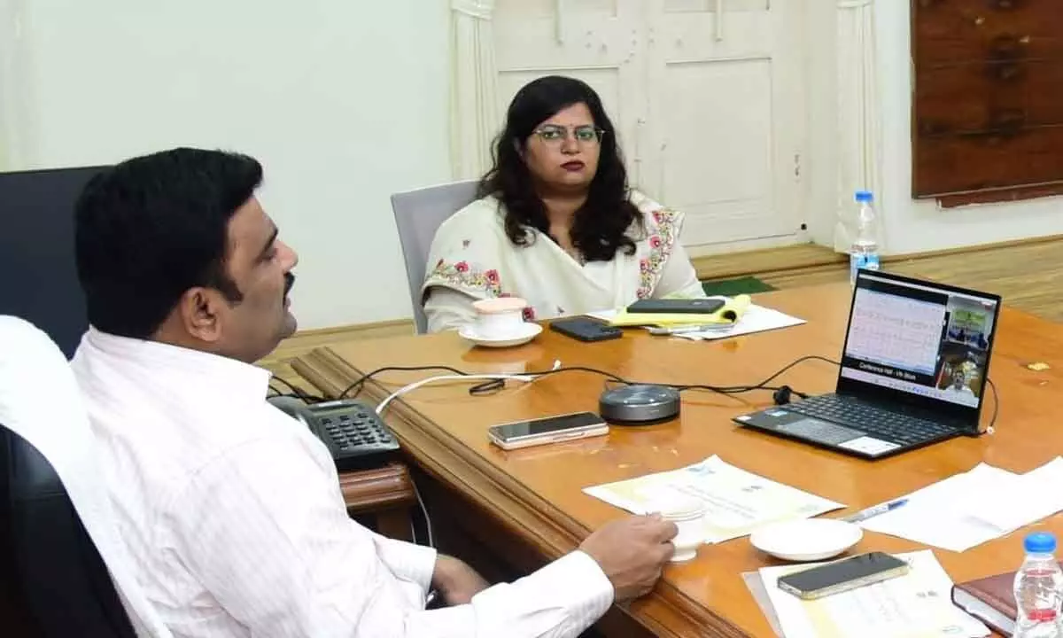 Krishna District Collector P Ranjith Basha participating in a video-conference from Machilipatnam on Thursday