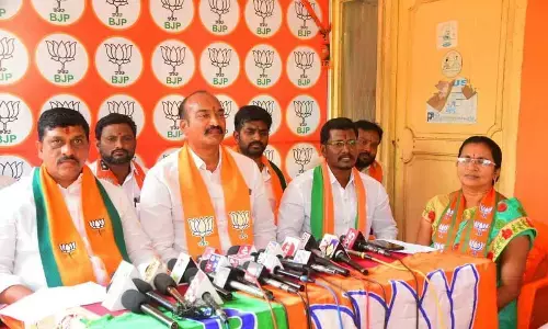 BJP State Kisan Morcha president Kondapalli Sridhar Reddy addressing media persons at district party office in Khammam on Friday.