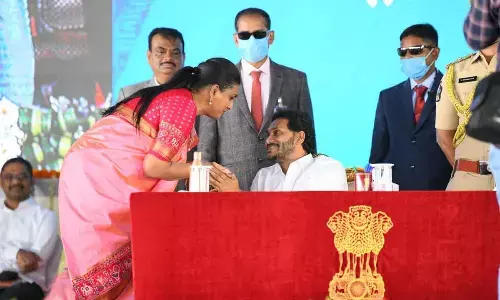 RK Roja with Chief Minister Y S Jagan Mohan Reddy after she took oath as the Minister in April 22