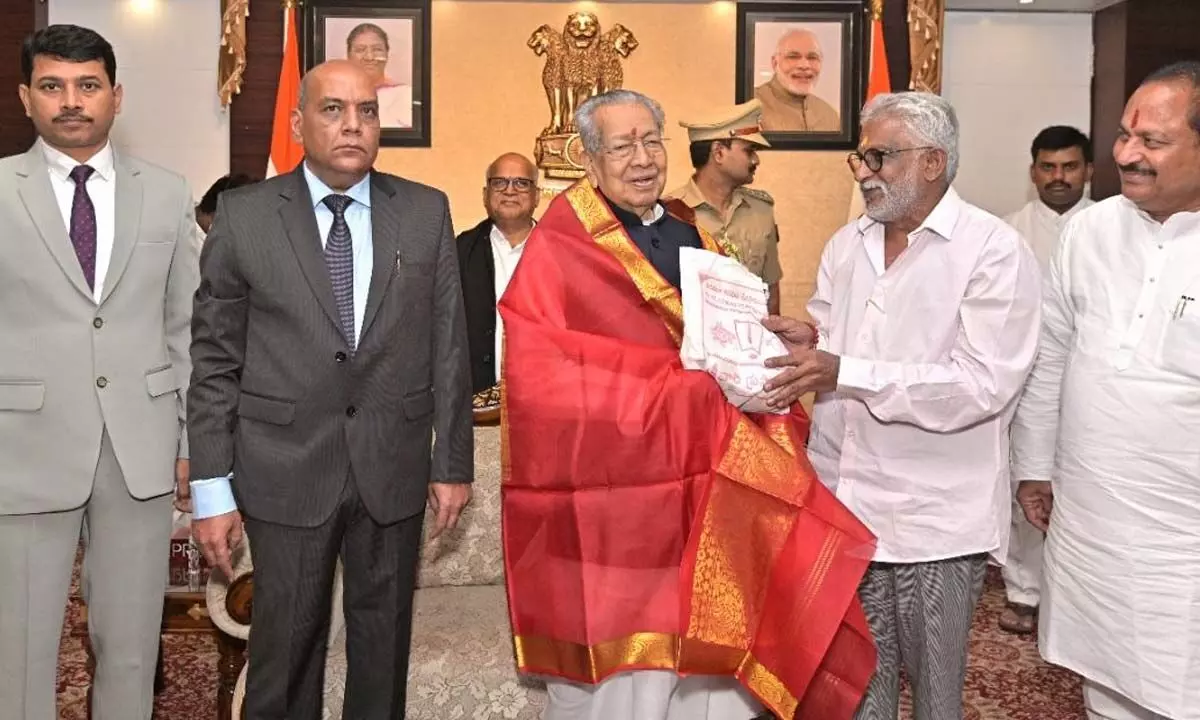TTD Chairman Y V Subba Reddy offering Srivari Prasadam to Governor Biswabhusan Harichandan at the Raj Bhavan in Vijayawada on Sunday