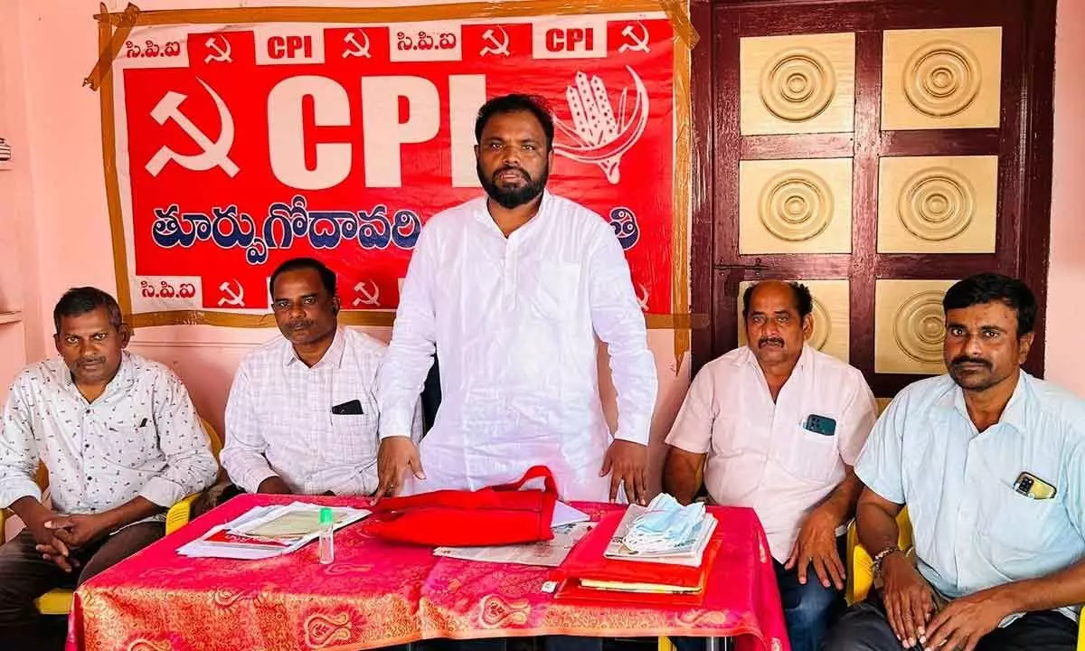 CPI district general secretary T Madhu addressing a meeting at the party office in Rajahmundry on Monday
