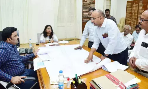 Krishna district Collector P Ranjith Basha conducting a review meeting in Machilipatnam on Monday