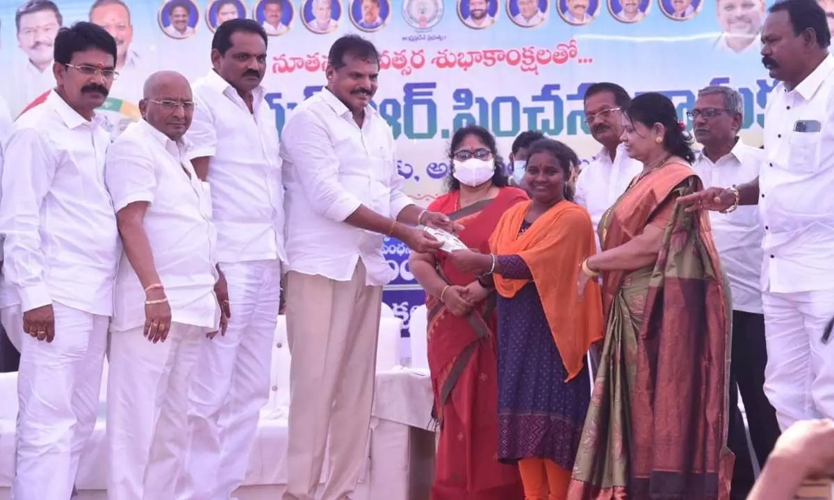 Minister Botcha Satyanarayana, Collector A Suryakumari and others distributing pensions to beneficiaries in Vizianagaram on Tuesday