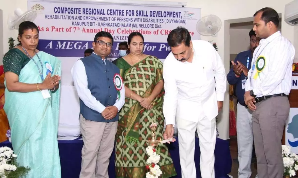 Agriculture Minister K Govardhan Reddy lighting the lamp to inaugurate a Mega Job Mela for the differently-abled at CRC in Venkatachalam on Tuesday