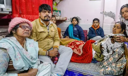 Family members of the 20-year-old woman Anjali Singh who was killed after being hit and dragged by a car