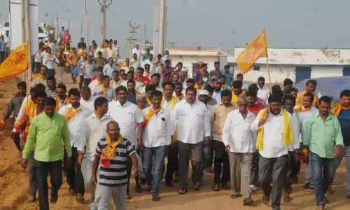 Former MLA and TDP leader Damacharla Janardhana Rao inspecting the works of a bridge on Buckingham Canal on Ongole - Kothapatnam road on Wednesday
