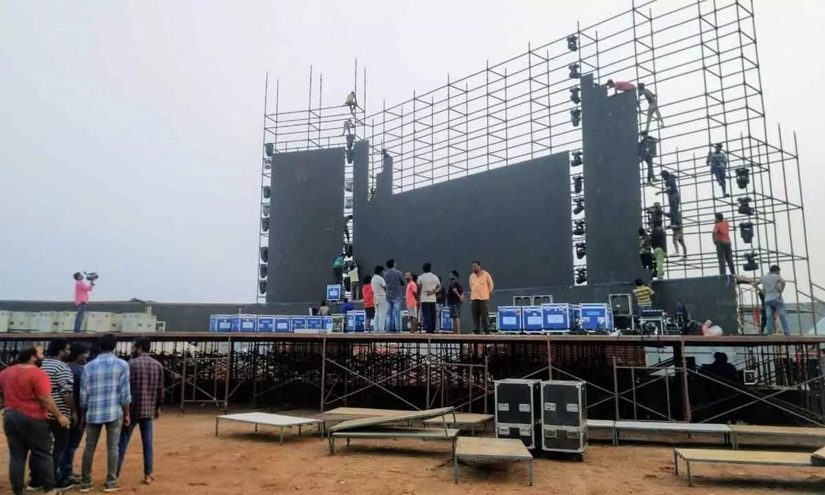 Set being constructed at the venue for the pre-release function of movie Veera Simha Reddy in Ongole on Thursday