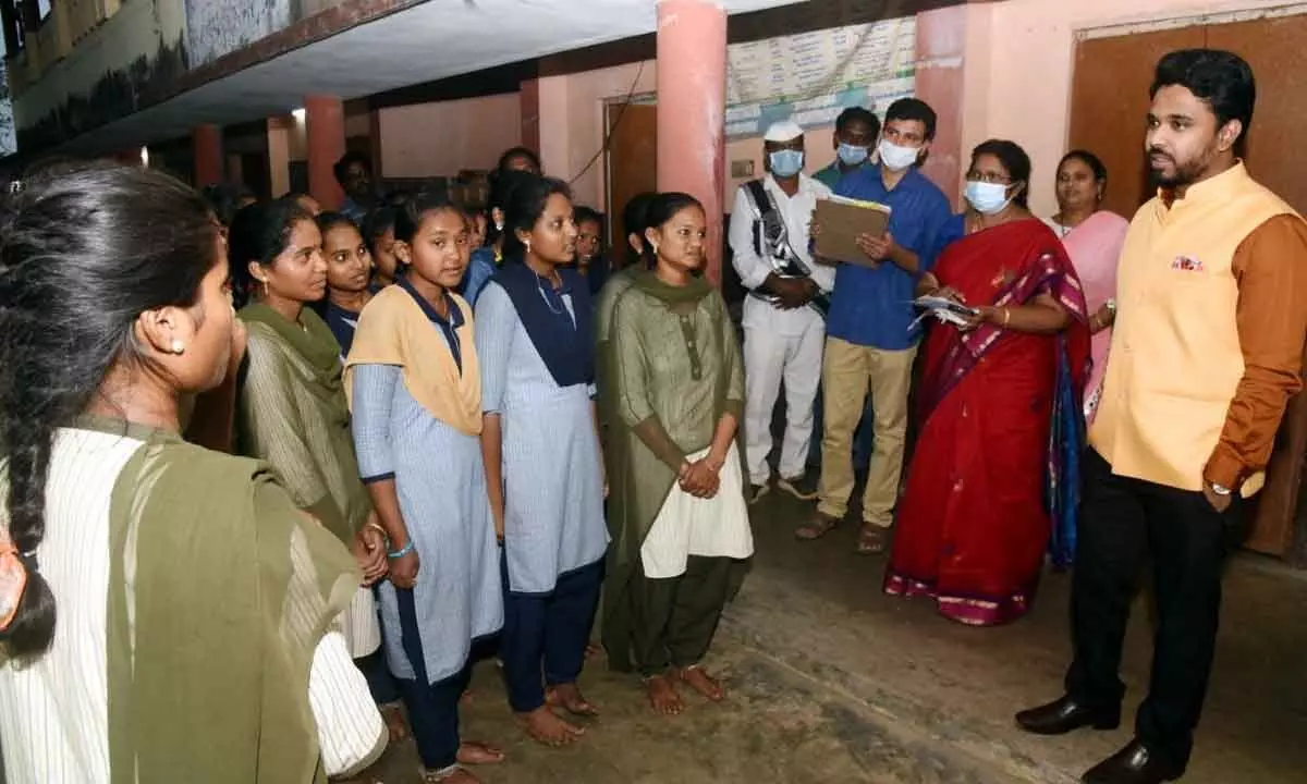 District Collector V Prasanna Venkatesh interacting with the girls of Welfare Hostel in Koyyalagudem on Thursday