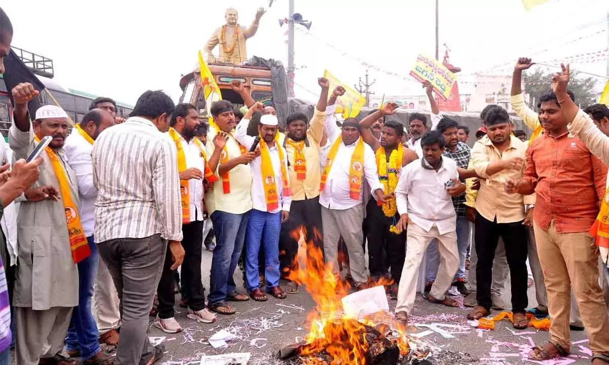 TDP activists burning copies of the GO No 1 at NTR statue in Vinukonda on Thursday