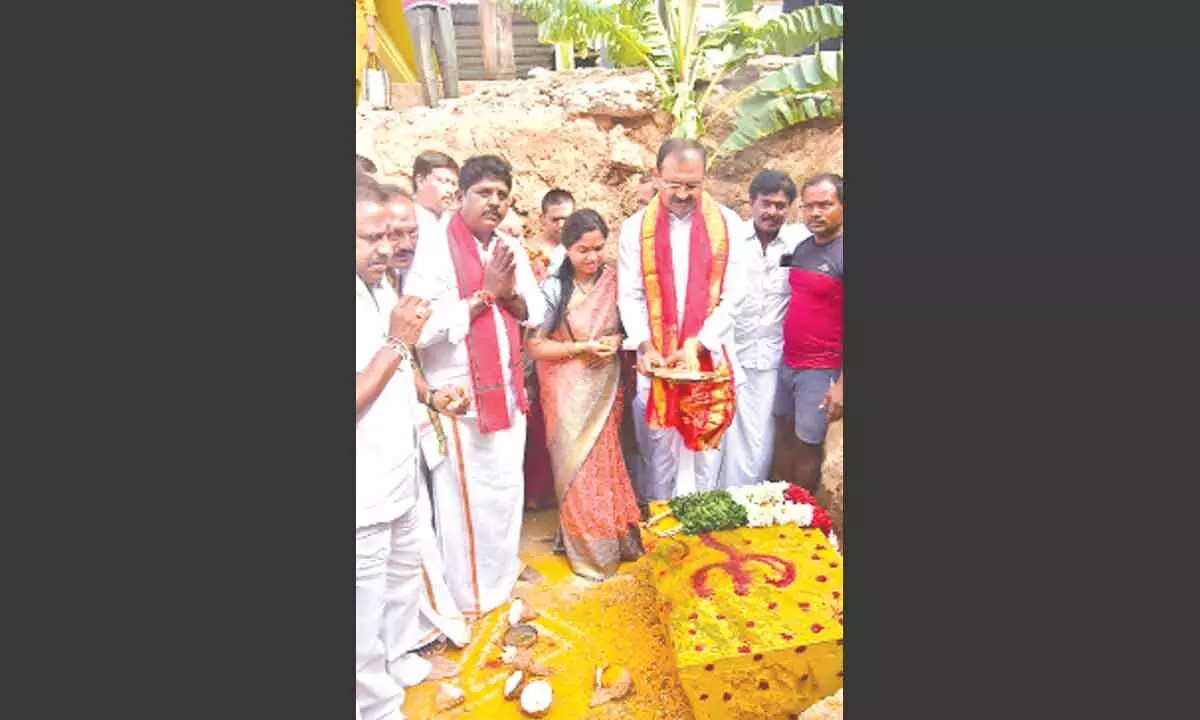 9 & 10. MLA Bhumana Karunakar Reddy laying foundation stone for the reconstruction of Gangamma temple in Tirupati on Friday. Mayor Dr R Sirisha and others are seen.