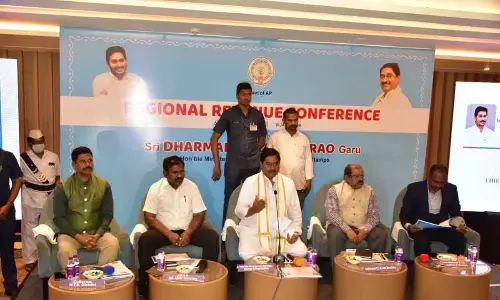 Revenue Minister Dharmana Prasada Rao addressing the regional revenue conference in Vijayawada on Friday