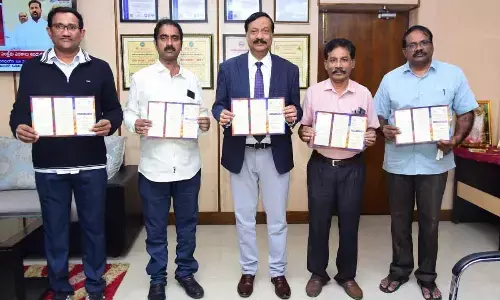 AKNU Vice-Chancellor M Jagannath Rao releasing brochure of a national conference at the University in Rajamahendravaram on Friday