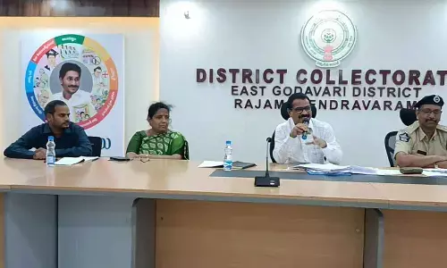 DRO G Narasimhulu reviewing the arrangements for conducting Group 1 Preliminary Examinations with the officials in Rajamahendravaram on Friday