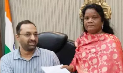 Commercial tax employee, A Rajeswari submitting complaint to district collector, Shrikesh B Lathkar at collector’s office on Friday