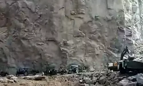 Afghan rescue team recovers 3 miners after 61 hours