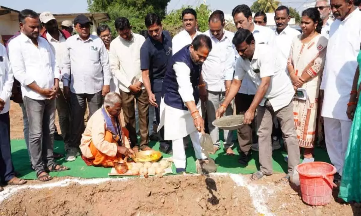 Assembly Speaker Tammineni Sitaram lays foundation stone for parking shed for electric vehicles involved in garbage disposal in Amadalavalasa on Monday