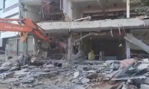 Raj paper leak: Bulldozer demolishes accuseds coaching centre in Jaipur