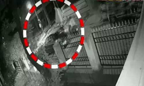 CCTV Footage of Meerpet corporators husband Prabhakar Reddy on Tuesday created a ruckus after hitting a bike with his car and attacking the bikers