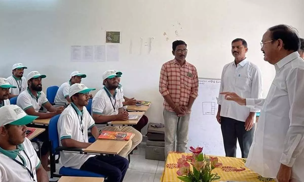 Former  Vice-President of India M Venkaiah Naidu addressing the youth undergoing training in mobile repairing at Swarnabharat Trust in Venkatachalam on Wednesday