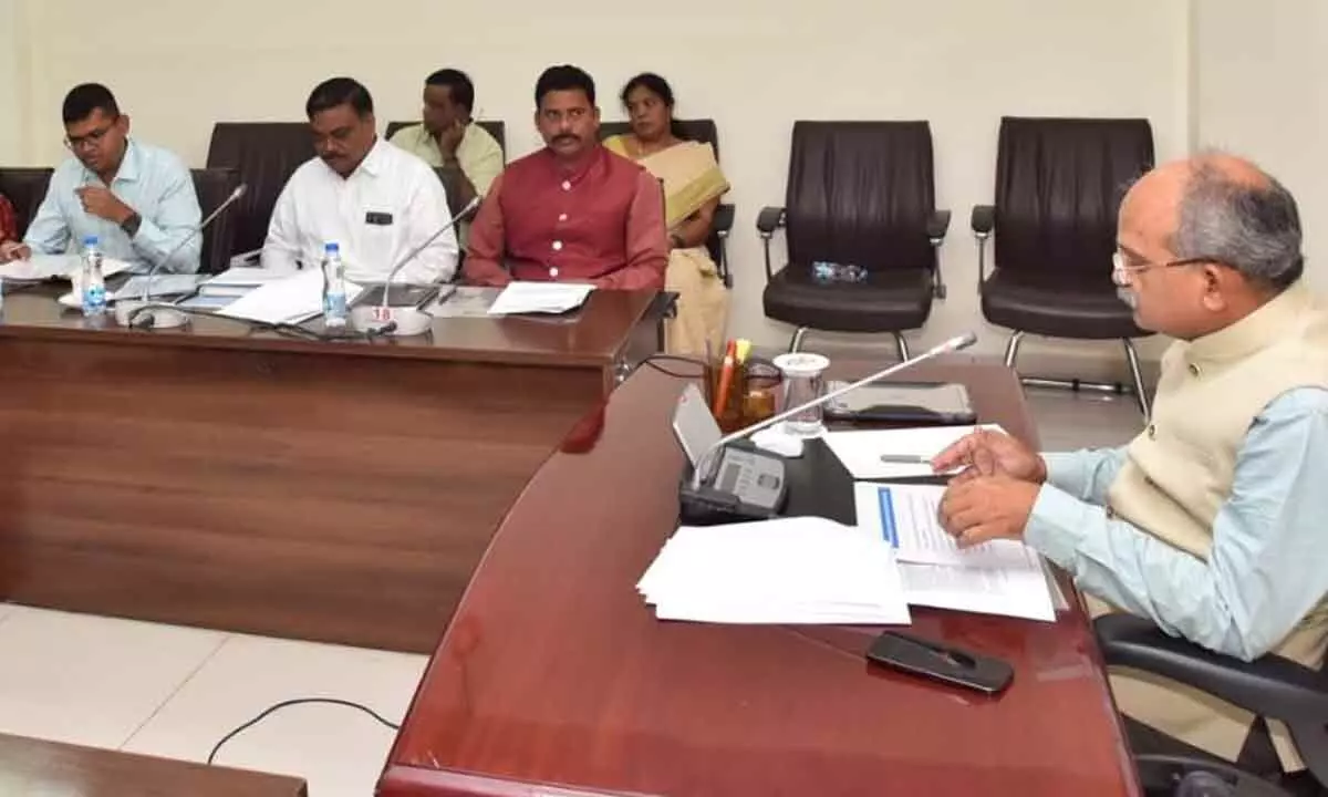 Chief secretary K S Jawahar Reddy conducting a video conference on Republic Day celebrations with officials from his camp office in Vijayawada on Wednesday
