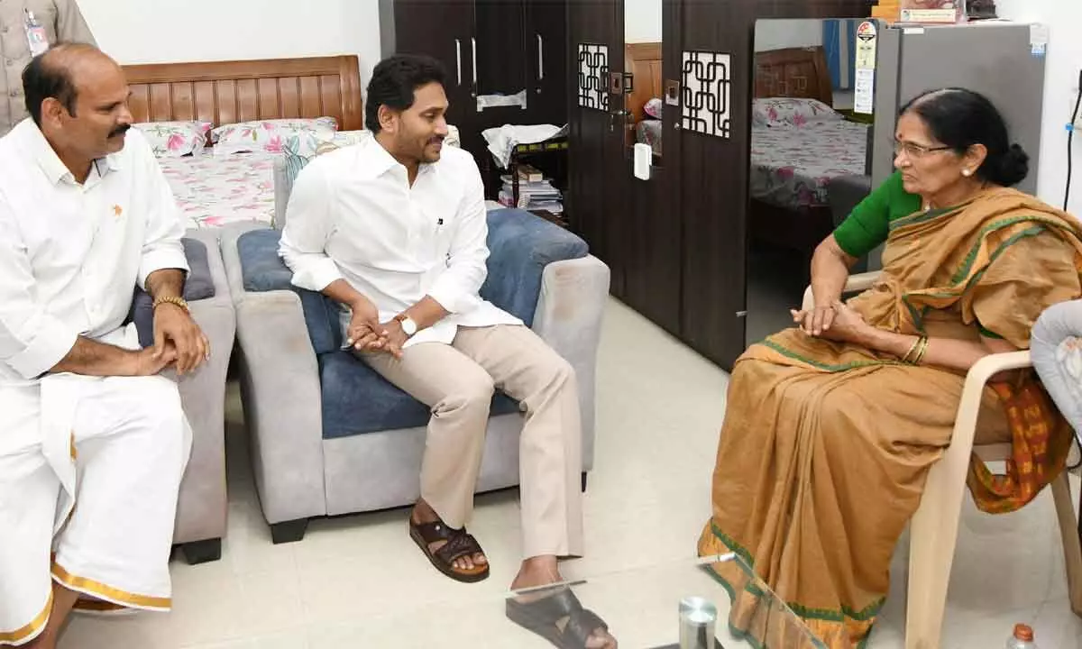 Chief Minister Y S Jagan Mohan Reddy consoles the family members of former MP K P Reddaiah in Vijayawada on Friday. Penamaluru MLA K Parthasaradhi is also seen.