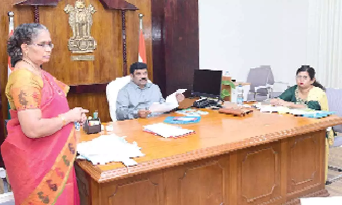 Krishna District Collector P Ranjith Basha conducting review meeting at Machilipatnam on Friday
