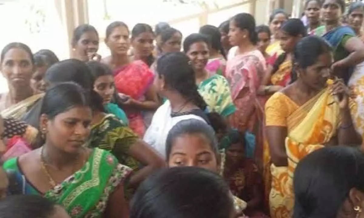 People waiting in long queues at OP counters at GGH in Anantapur