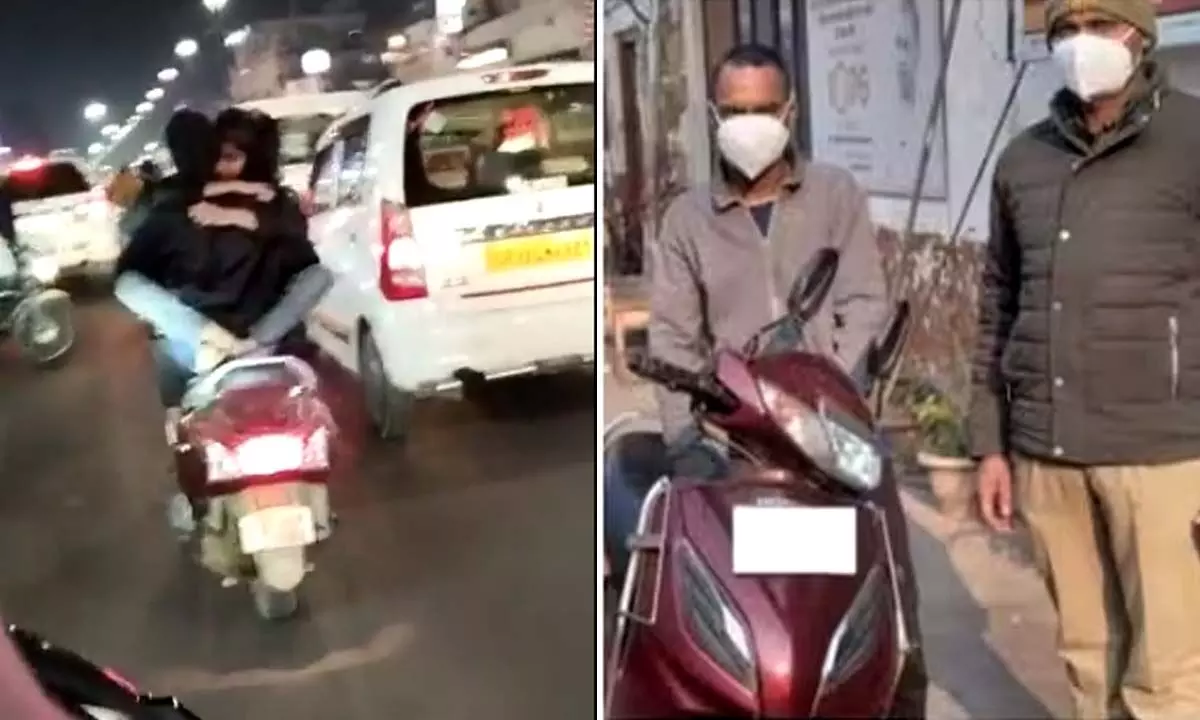 Man Romancing On Scooter Later Got Detained By Police