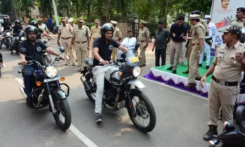 District Collector A Mallikarjuna flagging off the helmet rally organised in Visakhapatnam on Wednesday