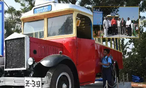 APSRTC Vice-Chairman and Managing Director Ch Dwaraka Tirumala Rao and Transport Secretary PS Pradyumna inaugurating 1930 model old bus at RTC city terminal in Vijayawada on Wednesday                                                       Photo: Ch Venkata Mastan