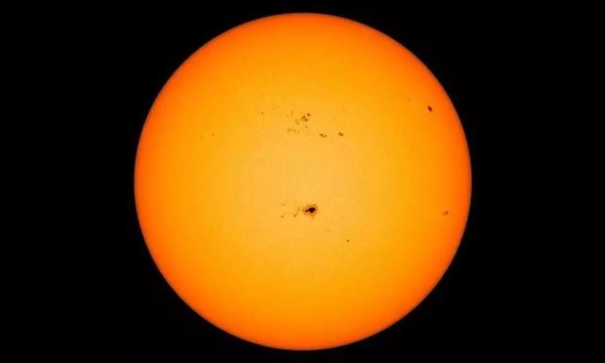 The highly active region AR3190 as seen on the Sun in centre