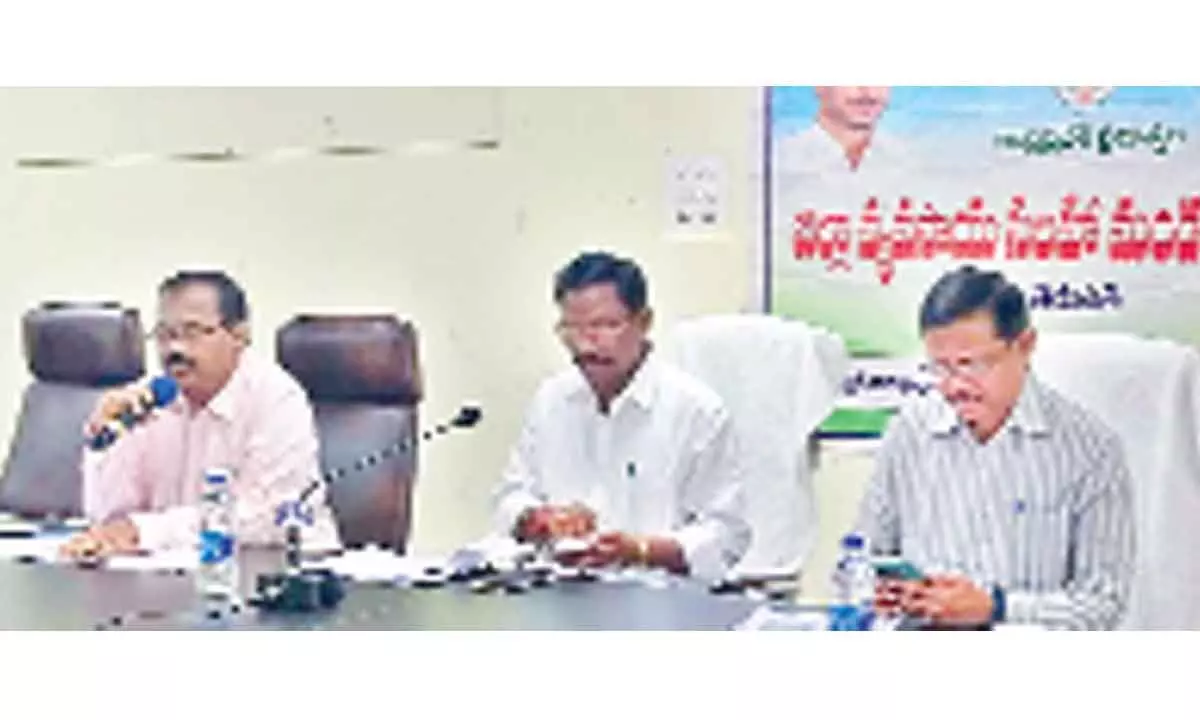 District in-charge Agriculture officer Prasada Rao speaking at the advisory council meeting in Tirupati on Friday. Satyavedu MLA K Adimulam and DRO M Srinivasa Rao are seen­