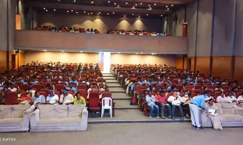 Ward secretaries and  VMC employees participating in a meeting in Vijayawada on Friday