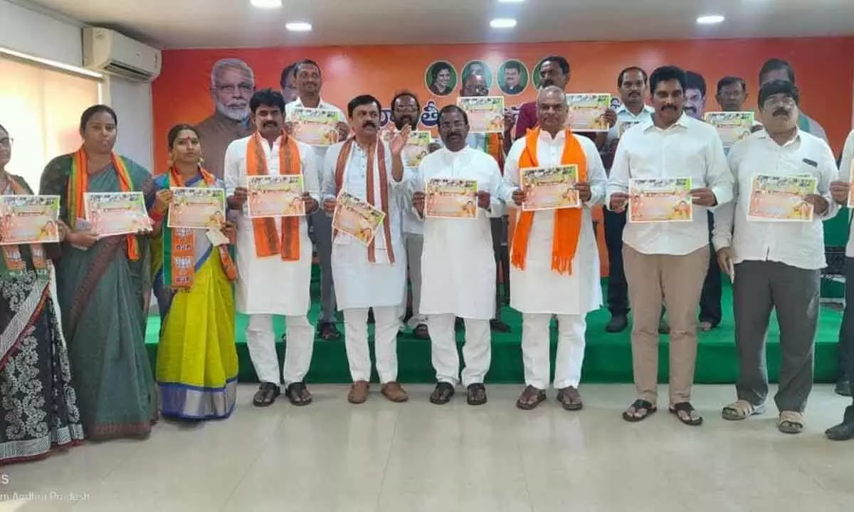 BJP state president Somu Veerraju, MP GVL Narasimha Rao, MLC PVN Madhav, among others, at the poster launch of the people connect campaign in Visakhapatnam on Sunday