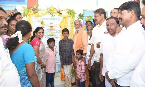 Energy Minister P Ramachandra Reddy inaugurating Sachivalayam building at Bangarupalyam in Chittoor district on Sunday