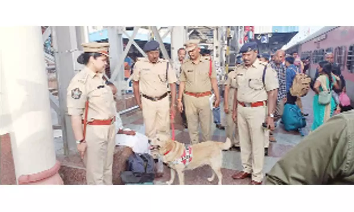 RPF and GRP officials conducting  security checks at Tirupati Railway station on Monday