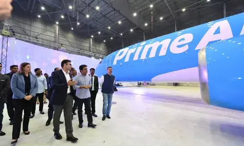 MA&UD Minister KT Rama Rao with Amazon, Vice President, Customer Fulfilment Operations, Akhil Saxena and Vice President, Amazon Global Air, Sarah Rhoads at the induction ceremony of Quikjet, new Amazon-branded aircraft in Hyderabad