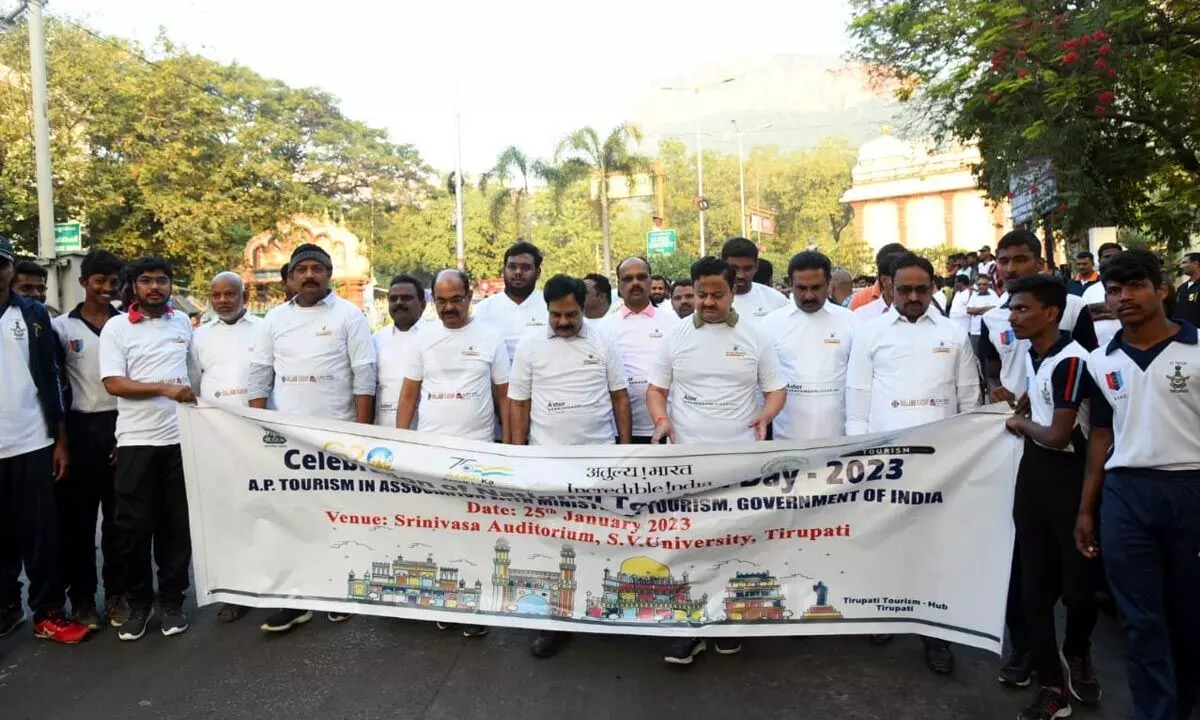 District Collector K Venkataramana Reddy, SV University Vice Chancellor Prof K Raja Reddy and others taking part in the 3k-Run in Tirupati on Wednesday on the occasion of National Tourism Day.